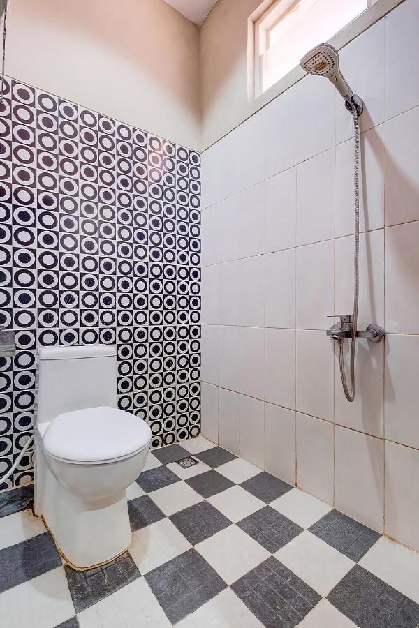 Oyo Flagship 3726 Tembok Batu Residence Tugu Dış mekan fotoğraf